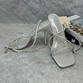 Spiked high-heeled shoes