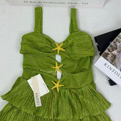V-neck halter dress with sequins on the skirt
