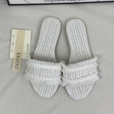 Flat-bottom fringed outer ankle bootie