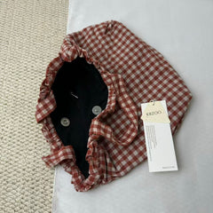 Small Red Handbag With A Checkered Pattern
