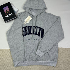 Hooded sweatshirt is loose