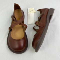 Leather high-top boots with soft flat soles