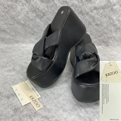 Outerwear with thick soles and high heels