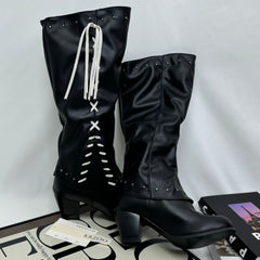Tasseled long boots made of leather