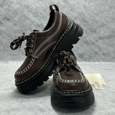 Sewn-on small leather shoes