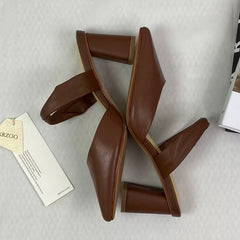 Thick leather strap with a headband and empty shoes