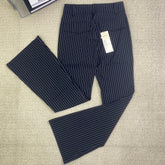 Striped pants are versatile and help slim the figure