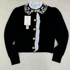 Short-sleeved blazer with ruffled edges