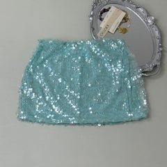 A figure-hugging midriff-baring half-length skirt