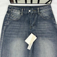 Washed and distressed denim pants