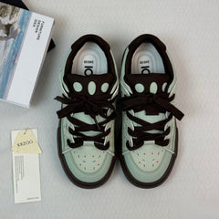 Mint sneakers with cushioned thick soles