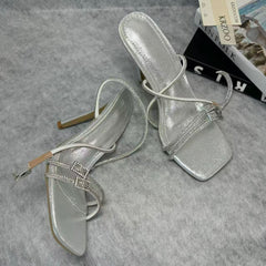 Spiked high-heeled shoes