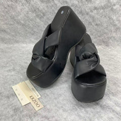Outerwear with thick soles and high heels