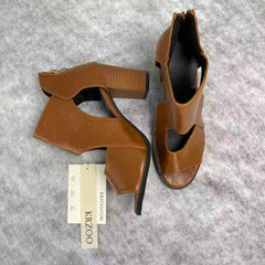 Fish-shaped hollowed-out thick heel high heels