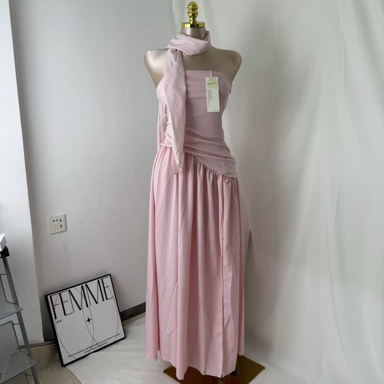 Pink-belted strapless dress