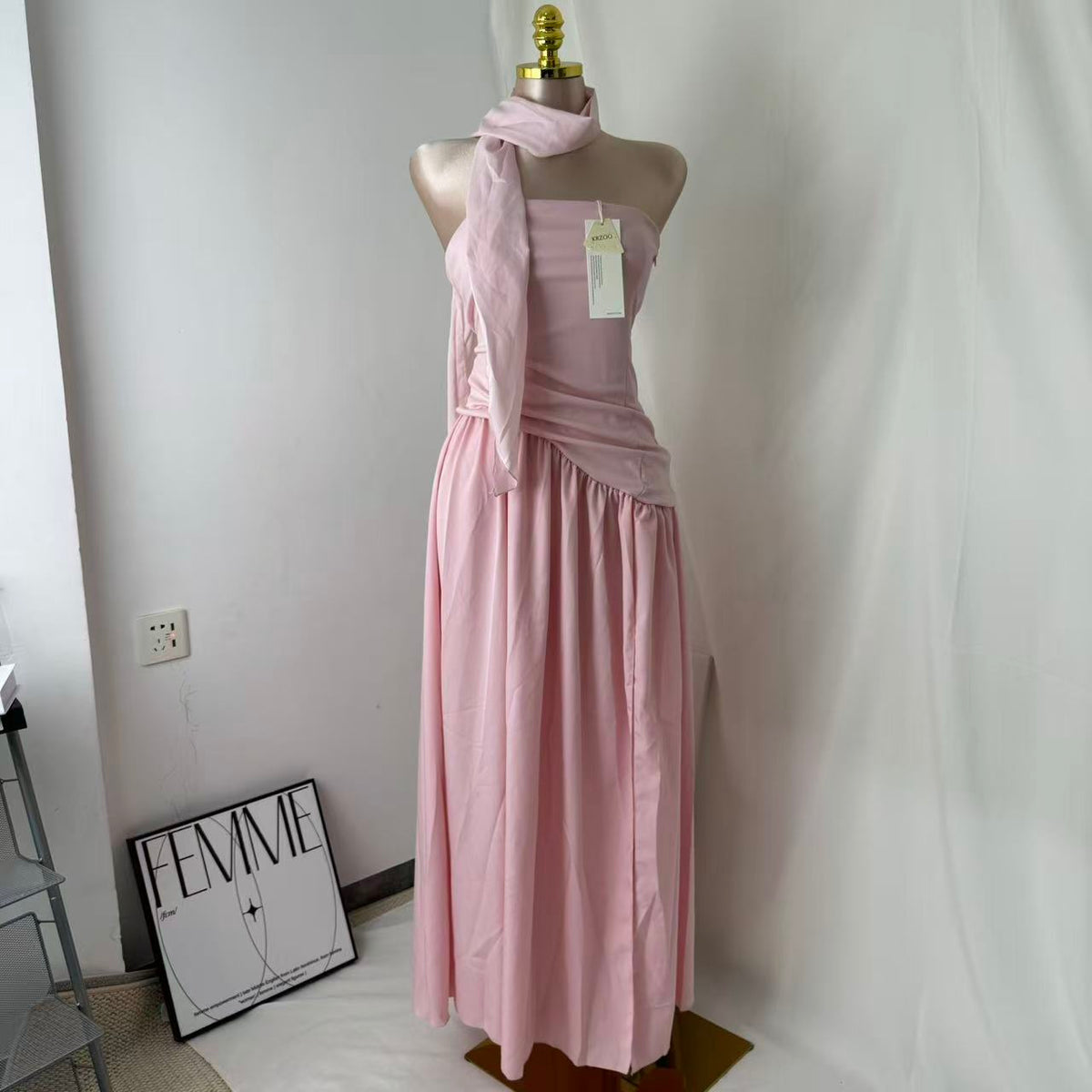 Pink-belted strapless dress
