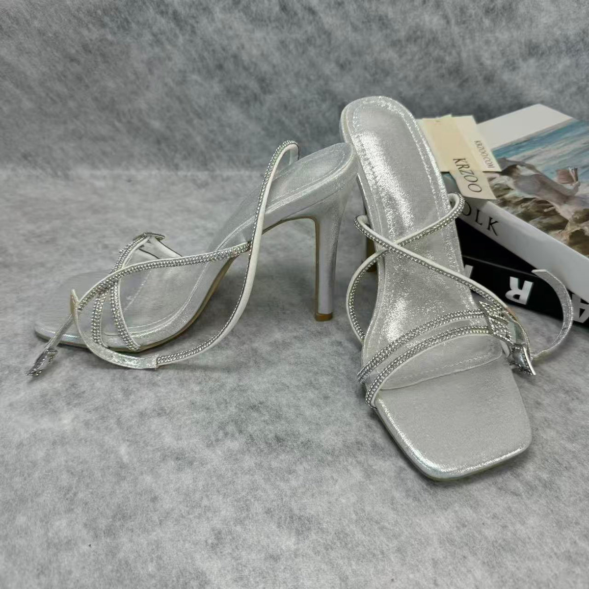 Spiked high-heeled shoes