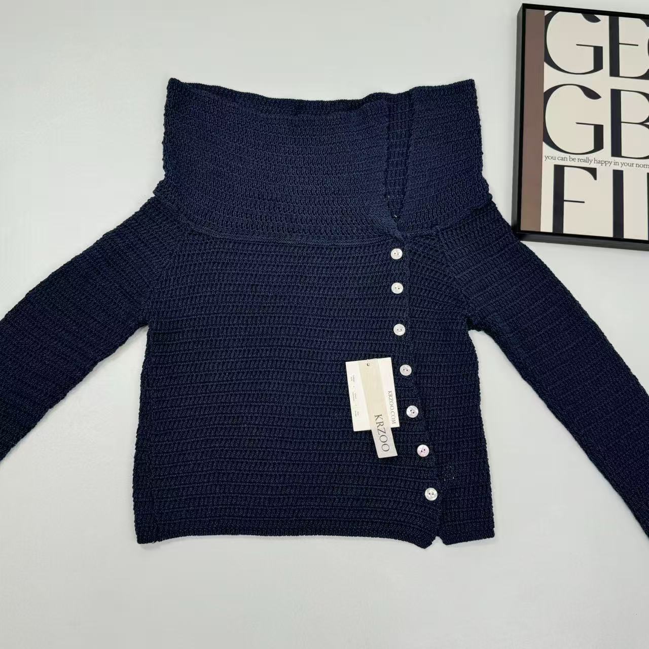 Asymmetric long-sleeved V-neck knitted top