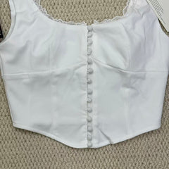 Padded round-necked vest with lace trim
