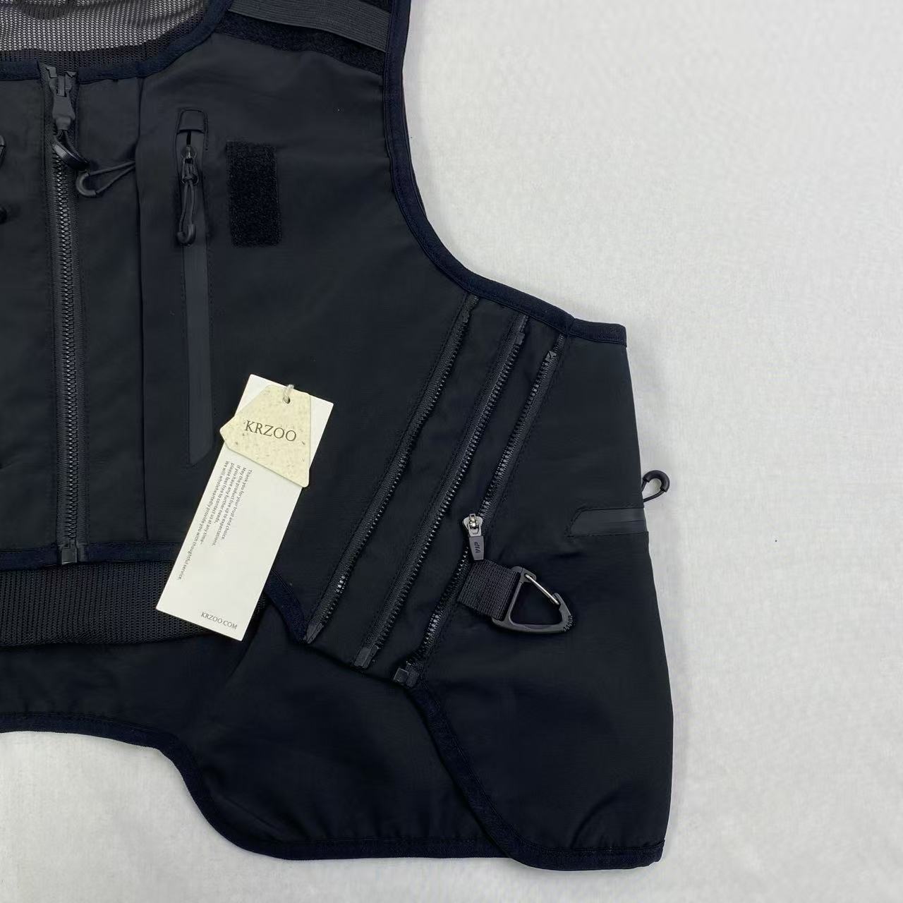 Dark black leather work jacket with no sleeves