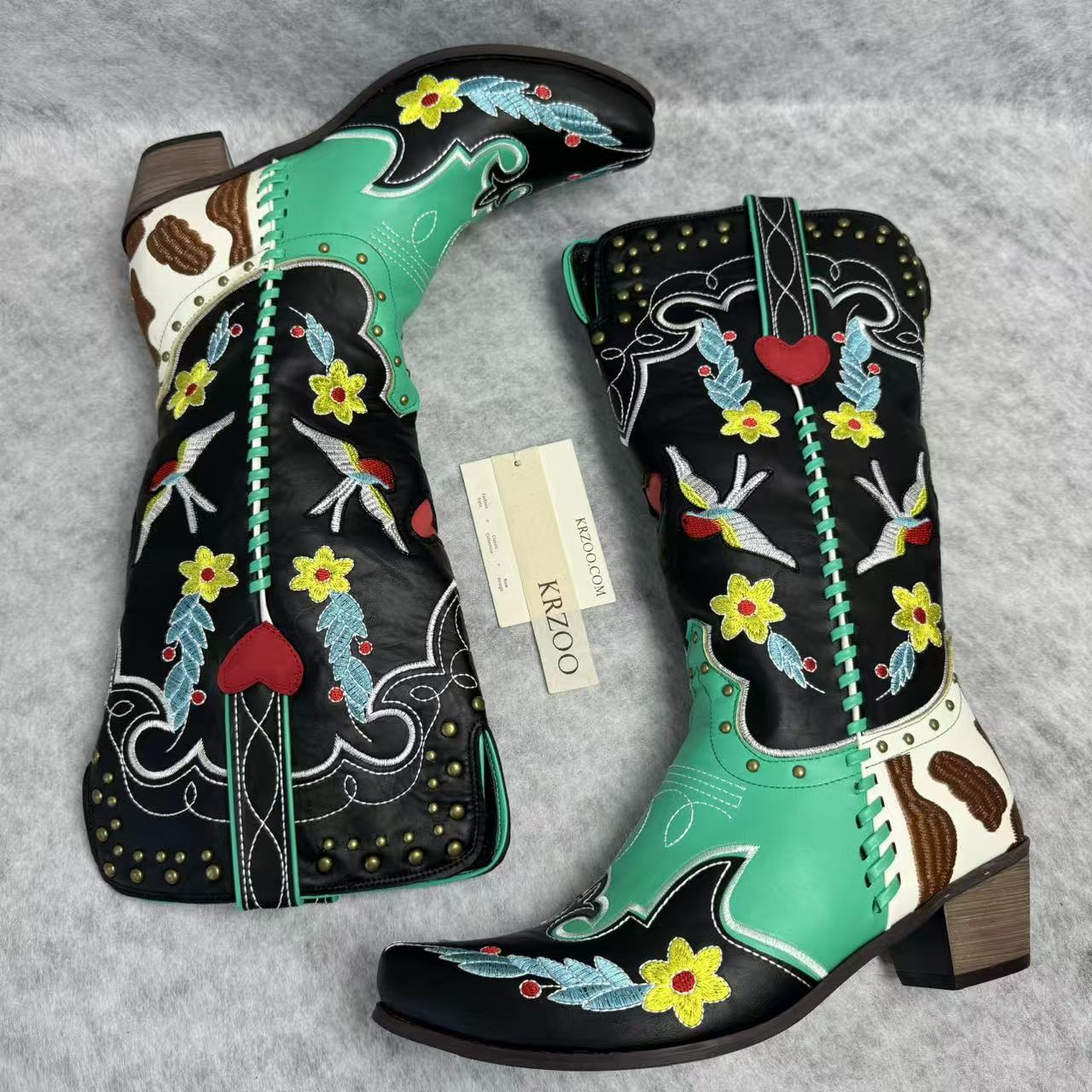 Embroidered rivet color-matched high boots