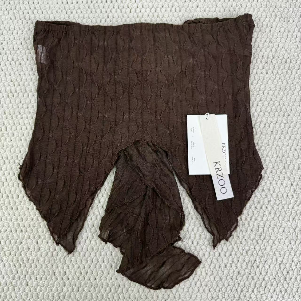 Irregular leaf-shaped sleeveless top with straps