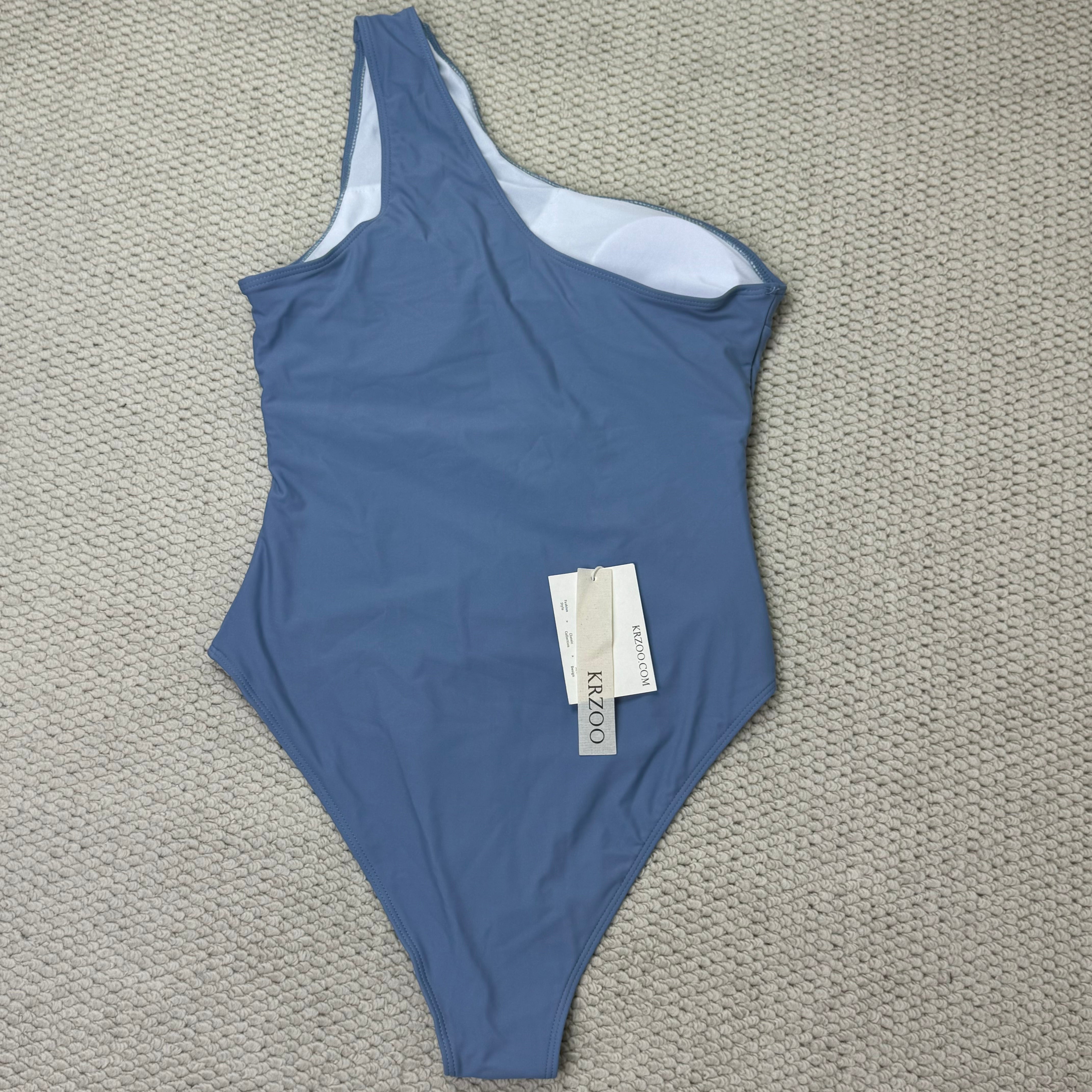 Solid-color irregularly perforated bikini