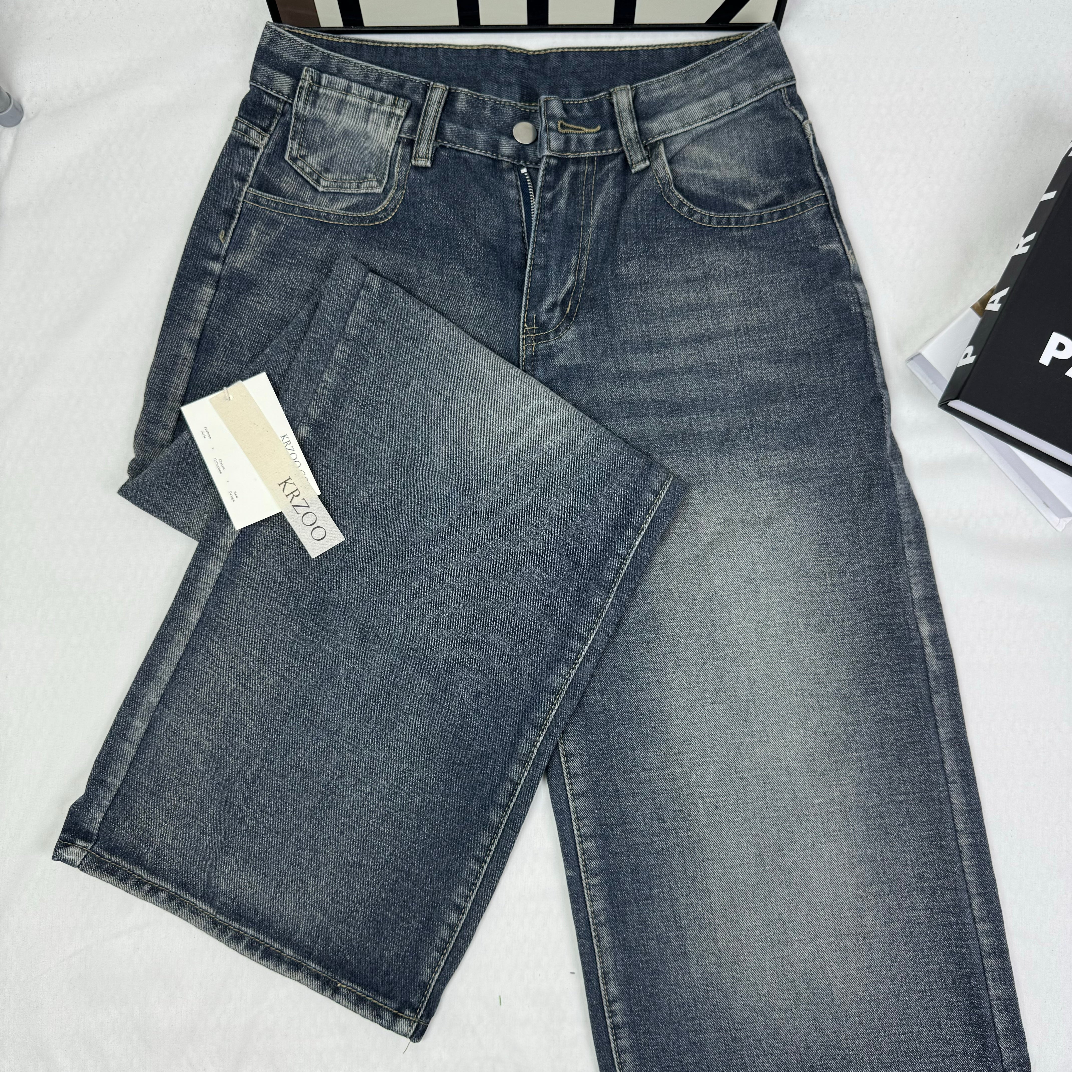 Washed and distressed denim pants
