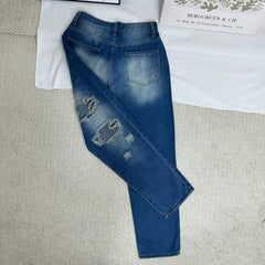 High-Waisted Ripped Jeans