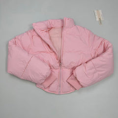 A slim-fitting short coat with a stand-up collar