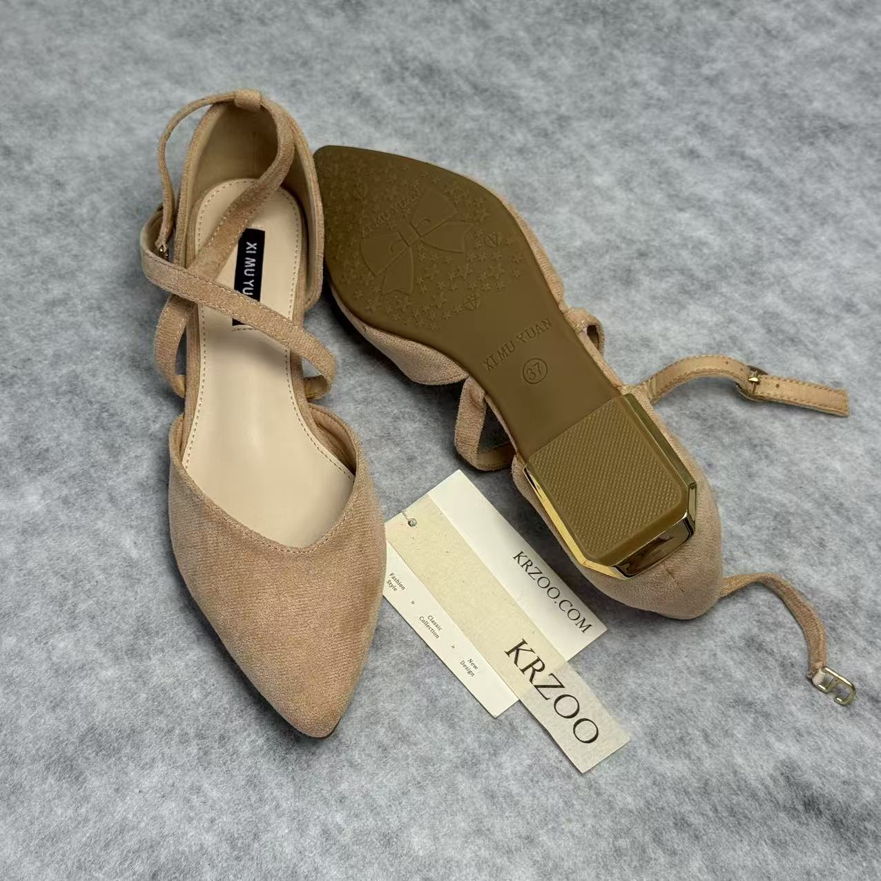 Low-cut flat-bottom shoes with crossed straps