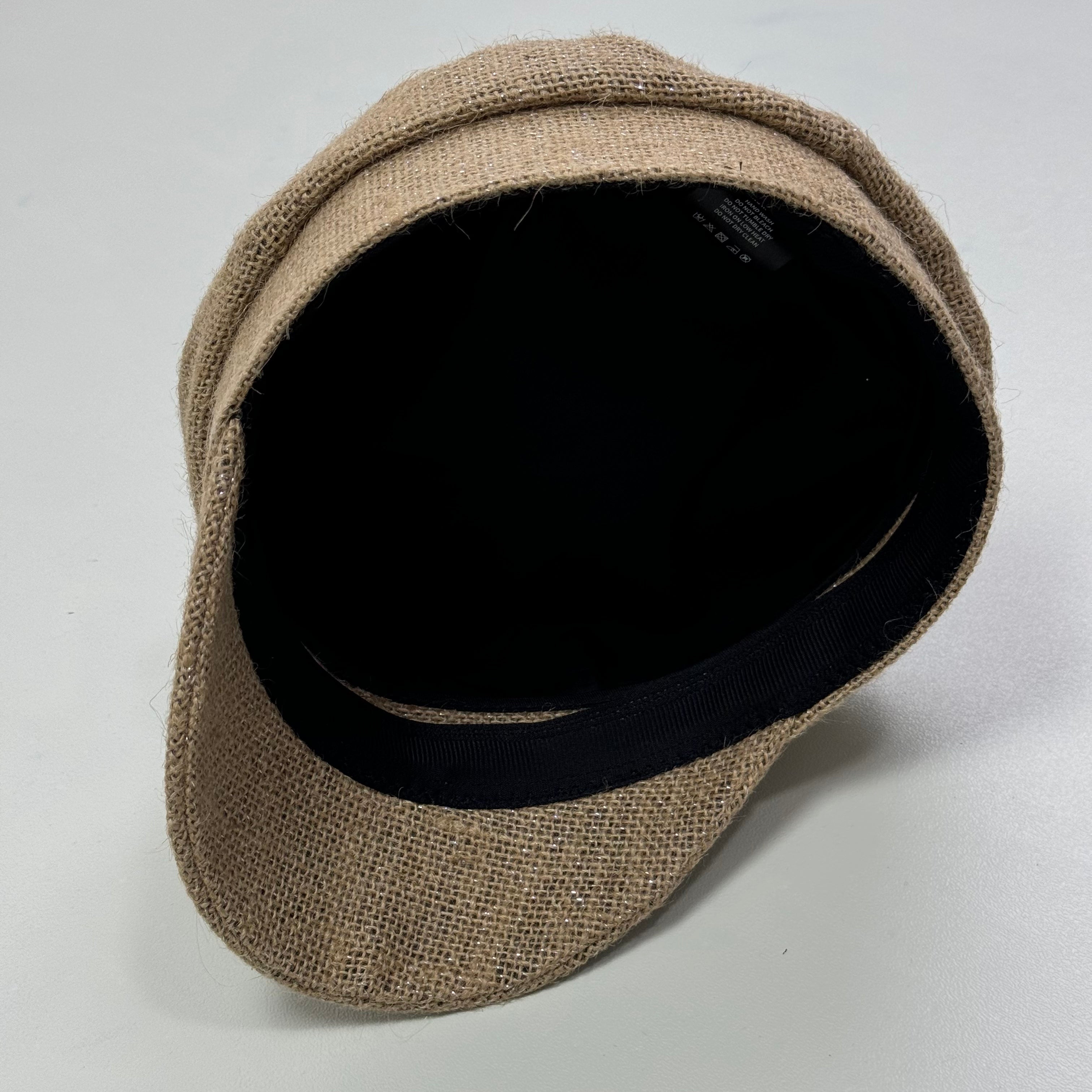Woven straw cap with a flat top