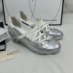 Bows tied to Mary Jane high-heeled shoes