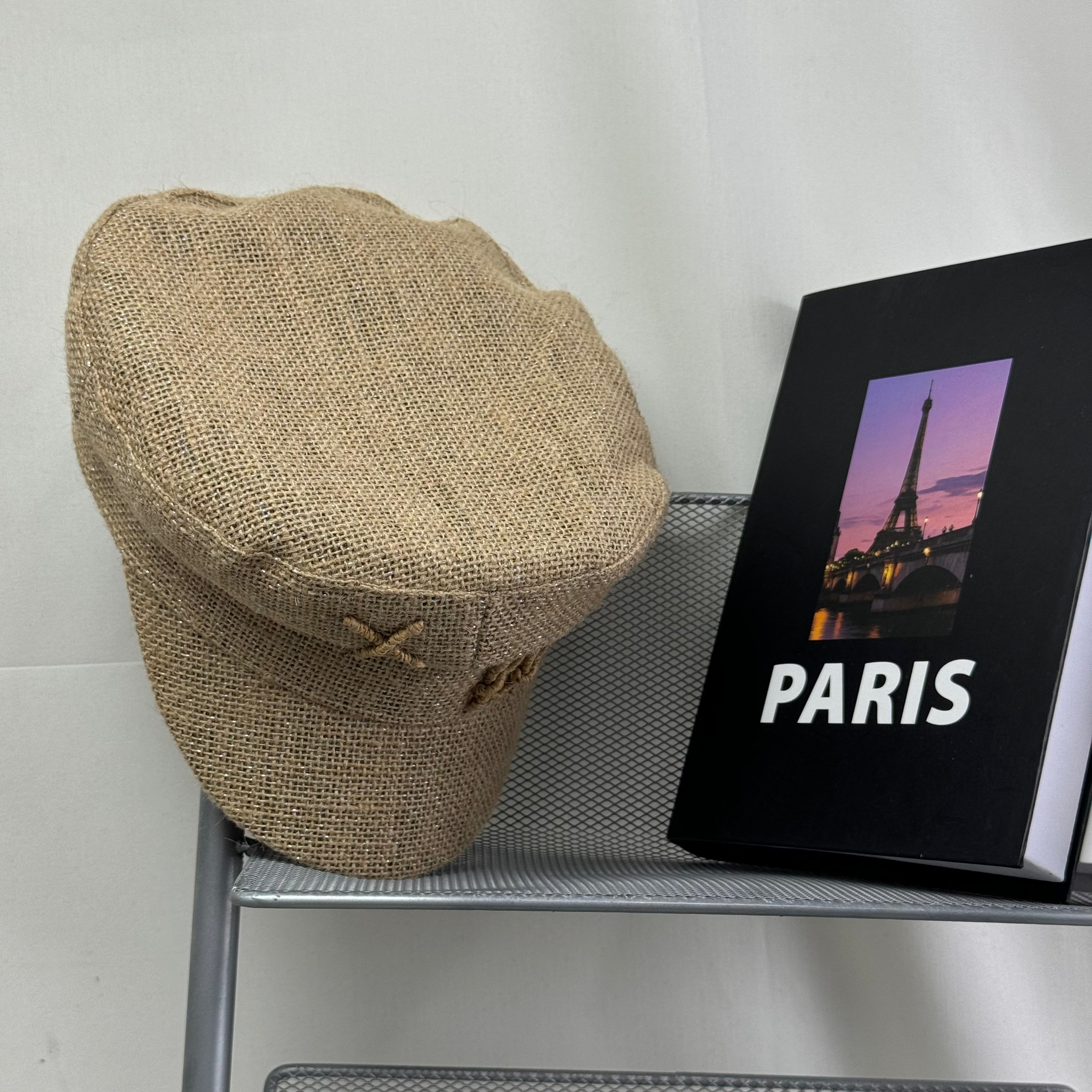 Woven straw cap with a flat top