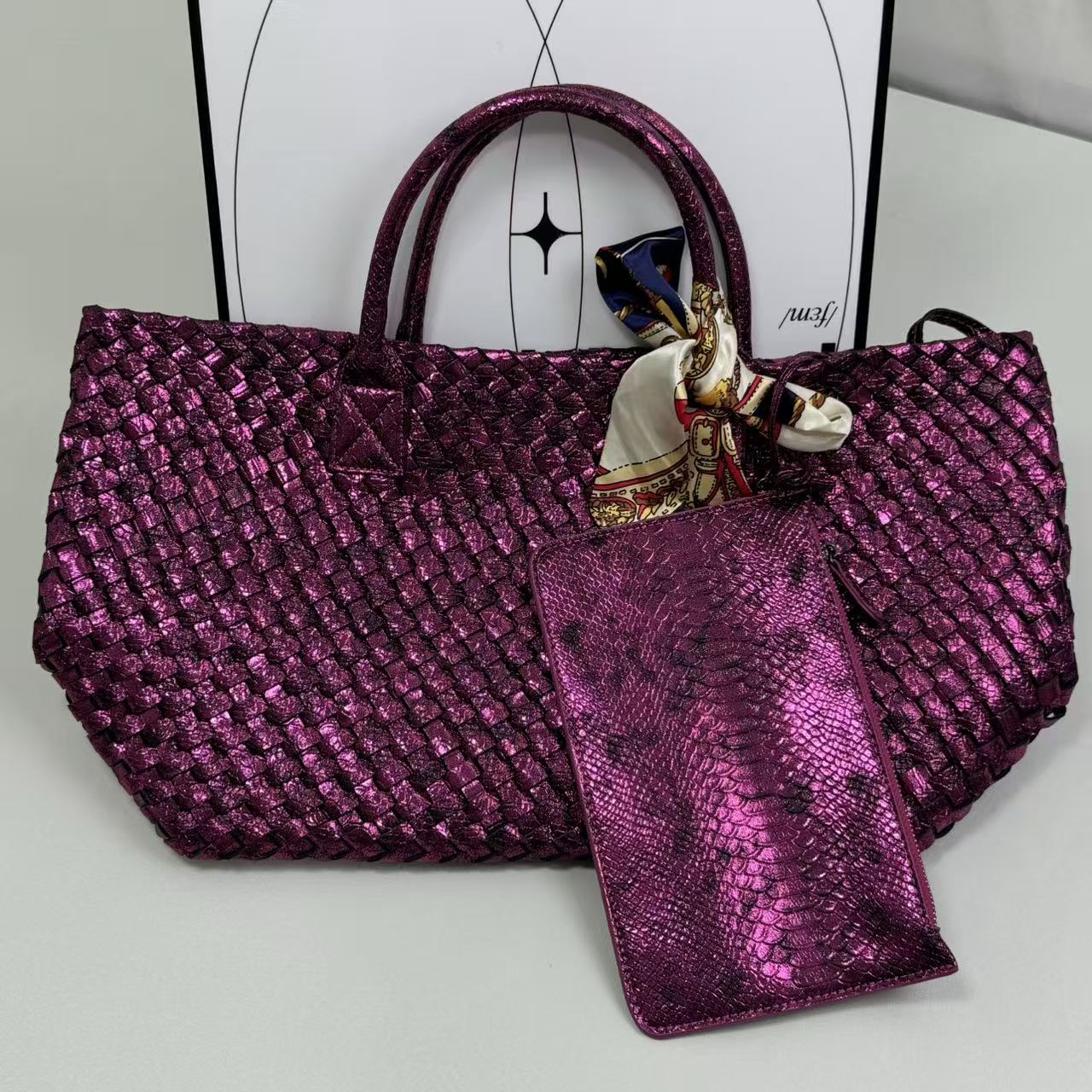Snake-pattern woven shoulder bag