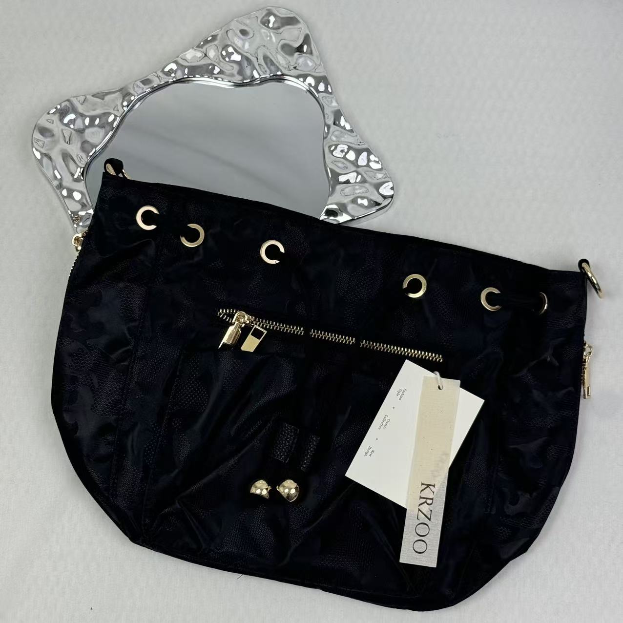 Zippered drawstring crossbody bag