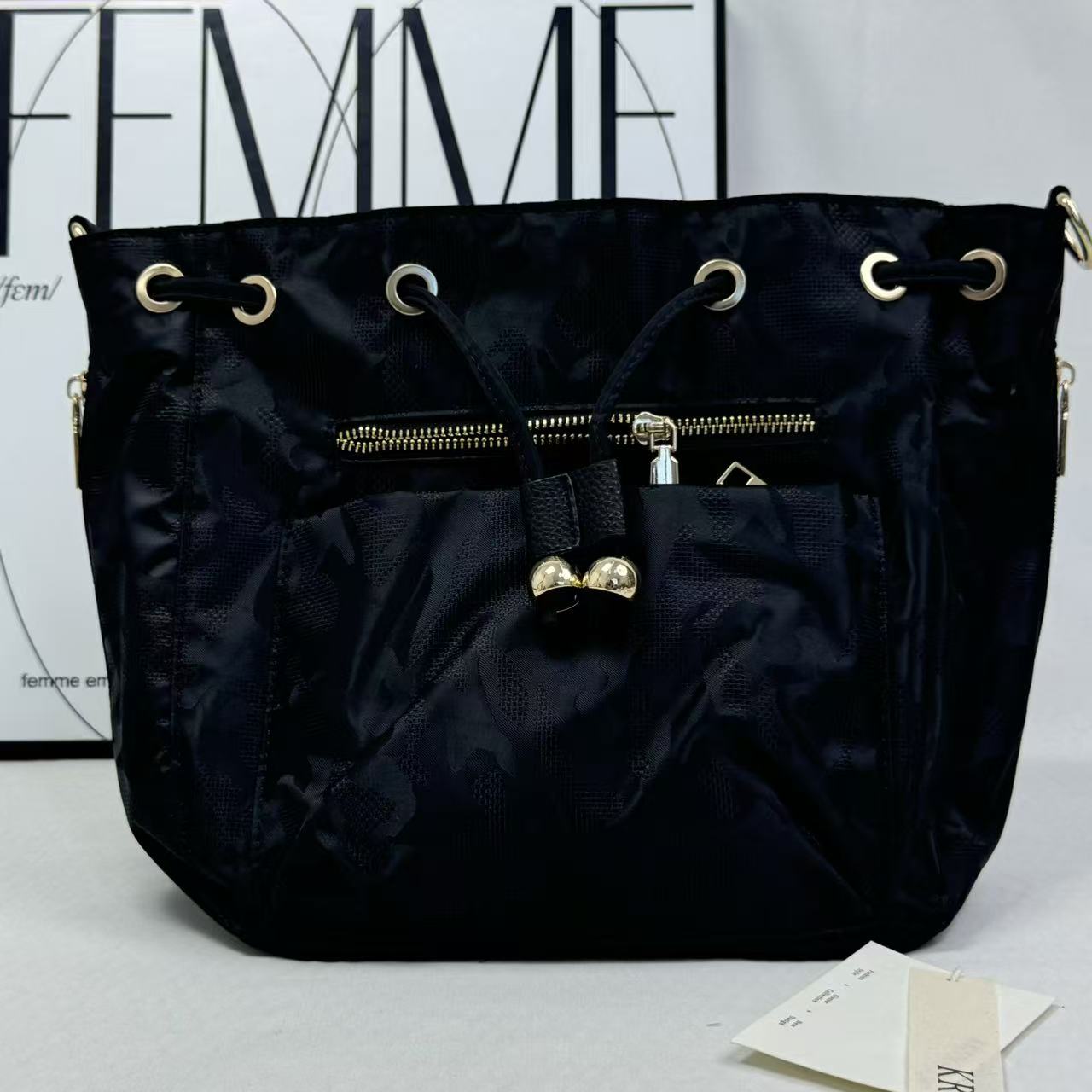 Zippered drawstring crossbody bag