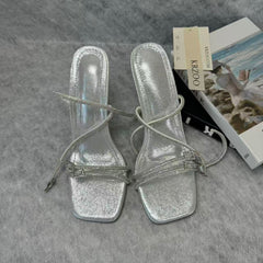 Spiked high-heeled shoes