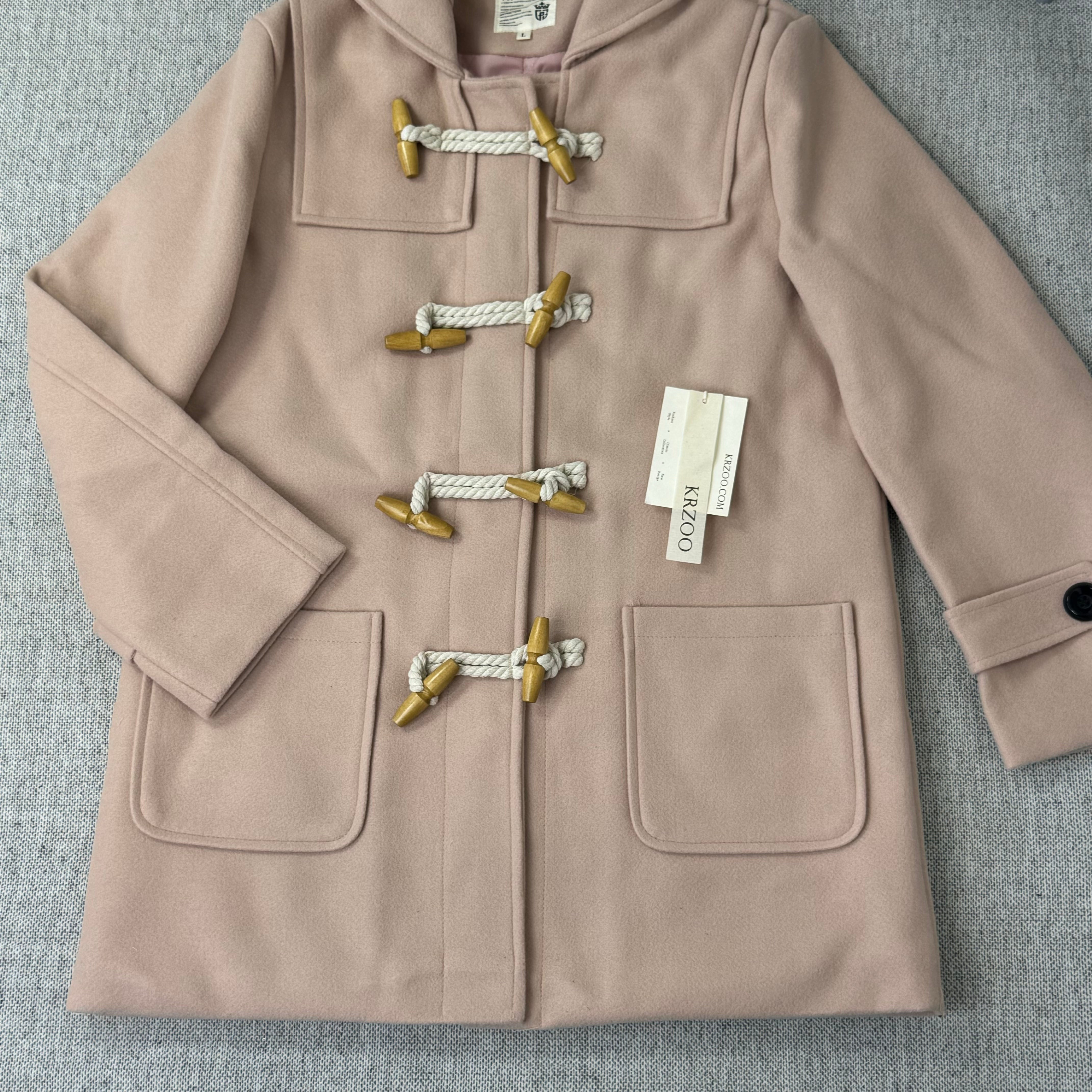 Solid-color double-buttoned woolen coat