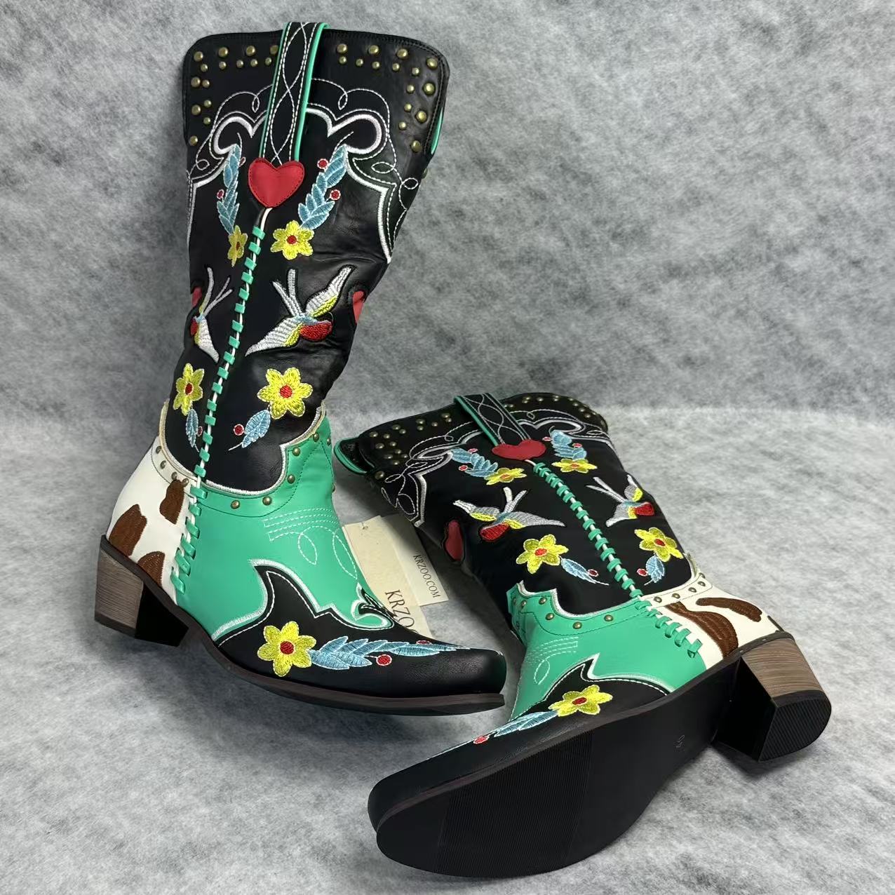 Embroidered rivet color-matched high boots