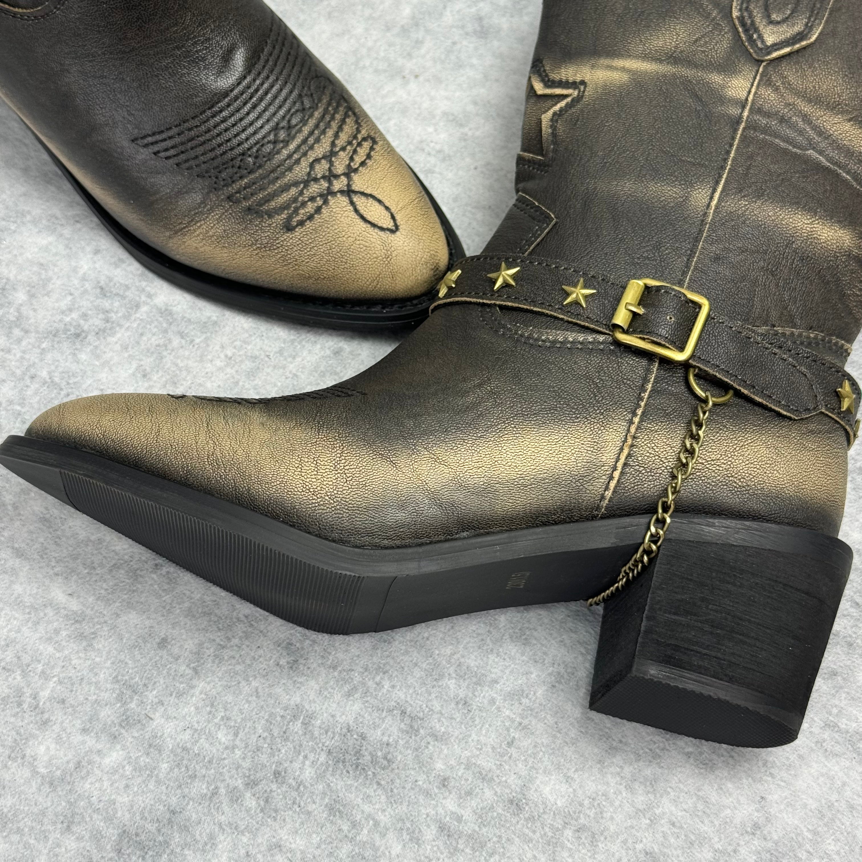 Painted and distressed western cowboy boots