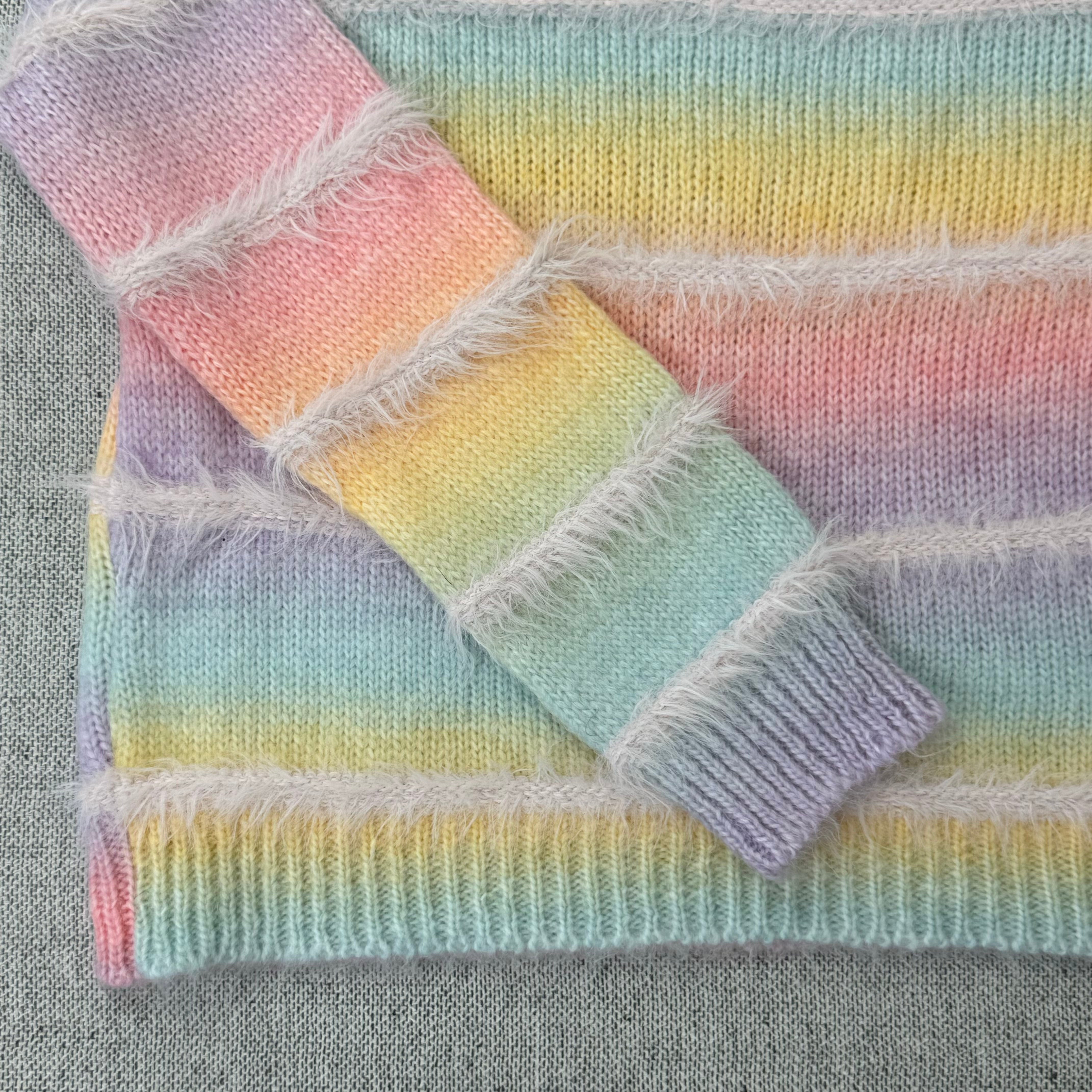 Gradient-colored striped pullover sweater