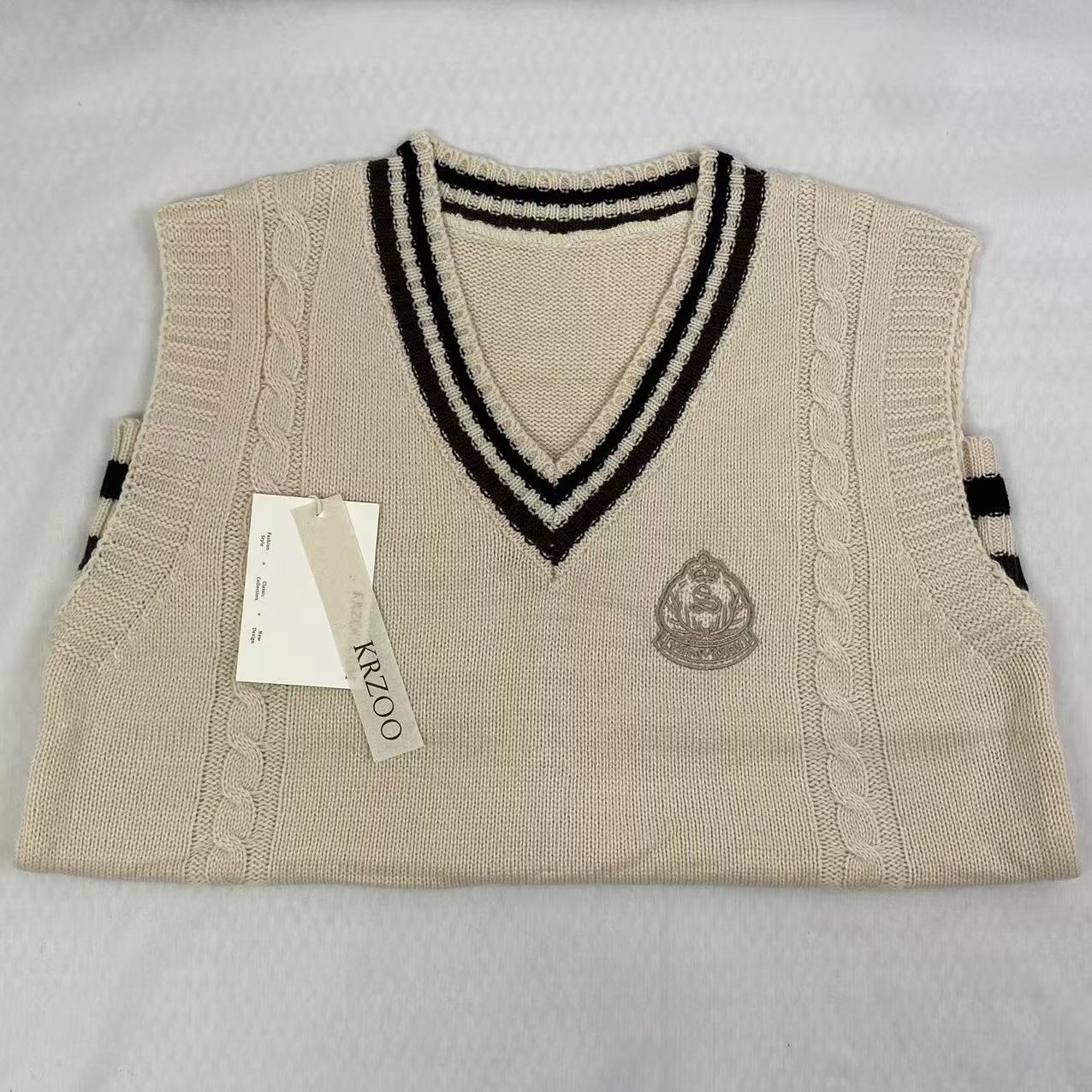 College-style knitted pullover vest