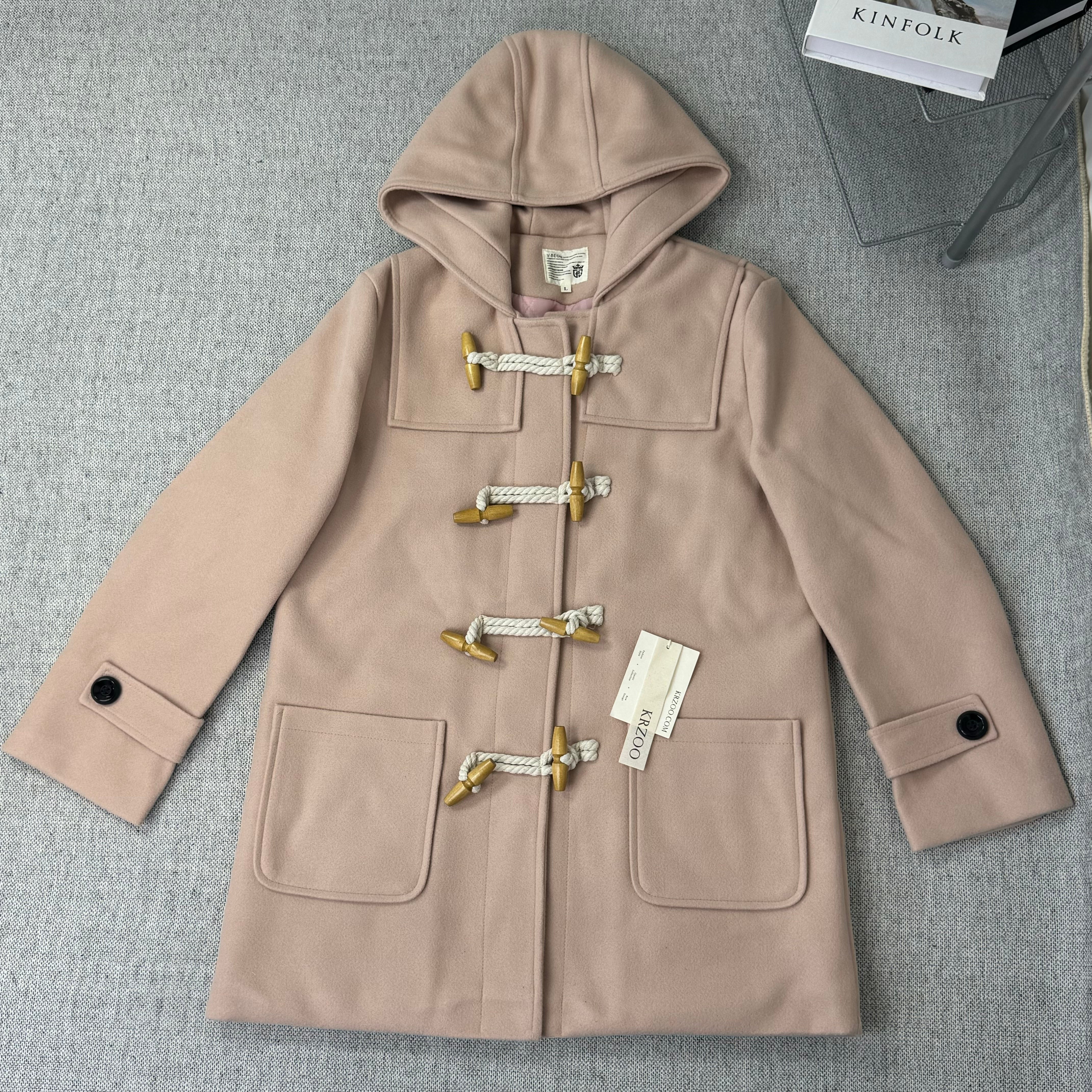 Solid-color double-buttoned woolen coat