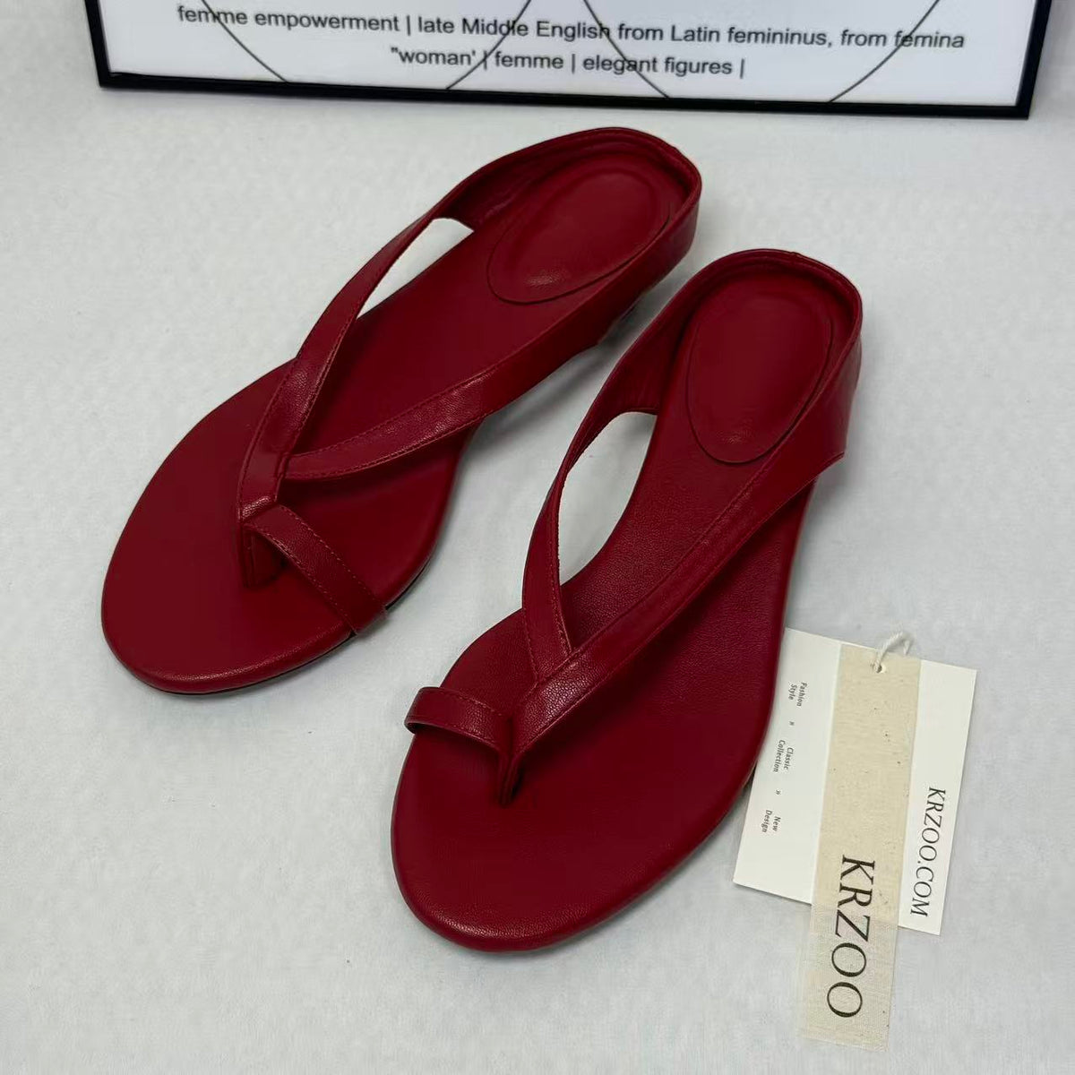 Fine ribbon pointed round-toed flip-flops