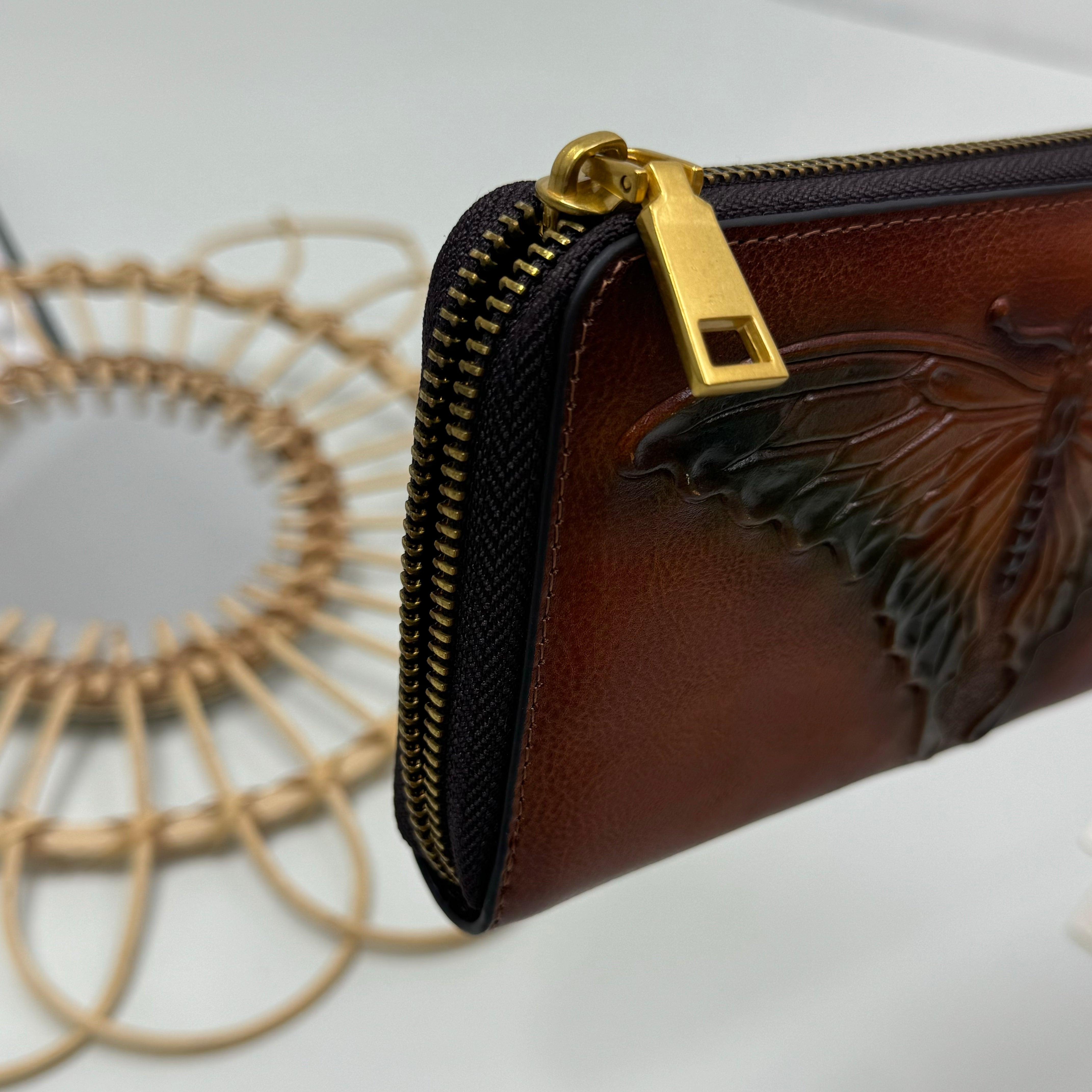 Butterfly embossed leather wallet