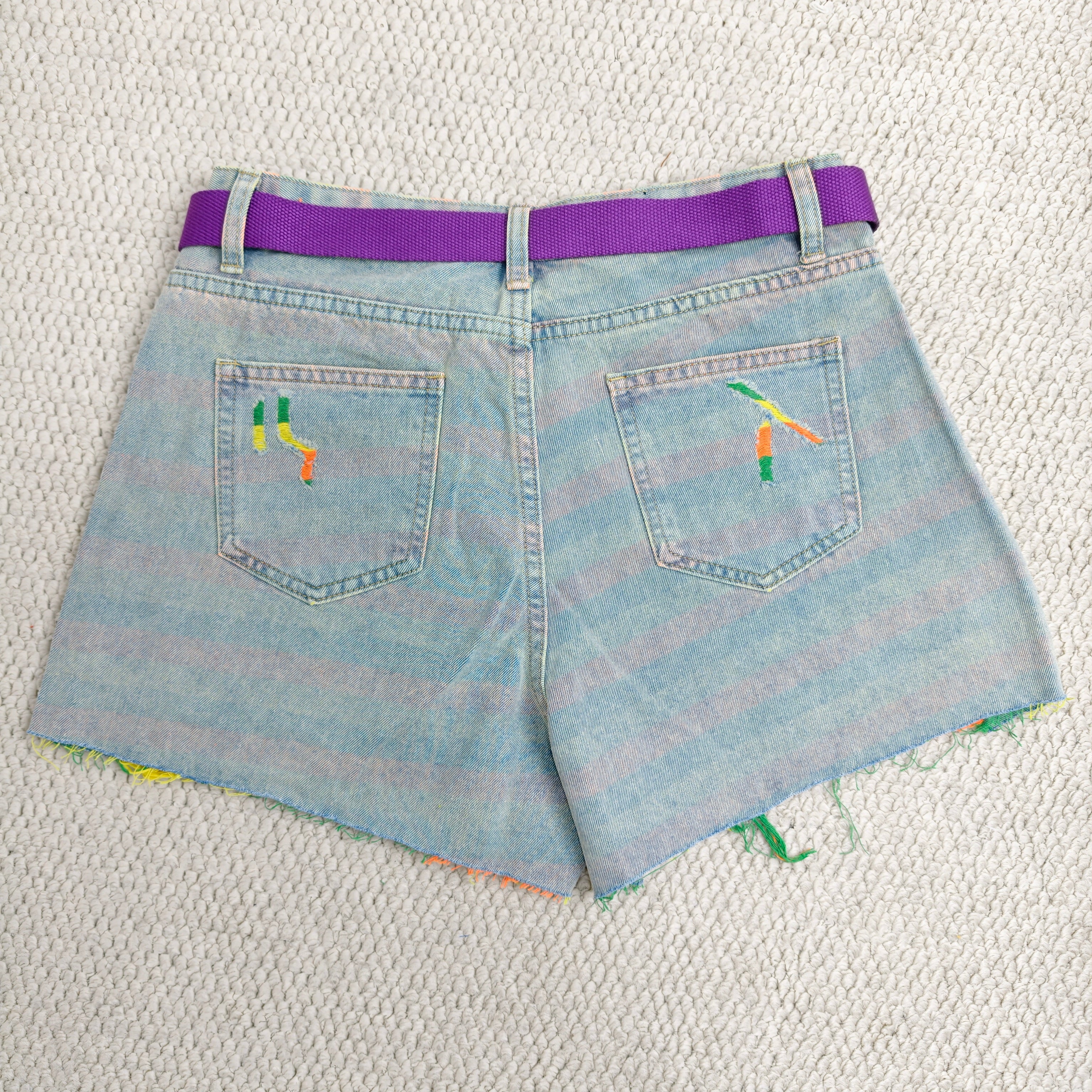 Striped holey denim shorts