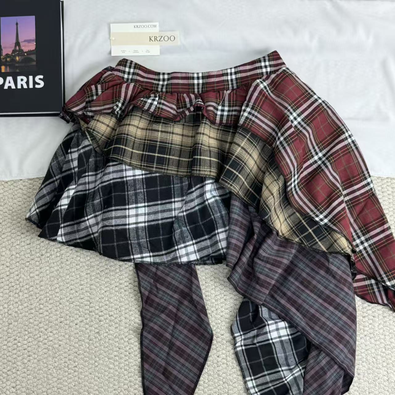 Irregular color-matched plaid half-length skirt