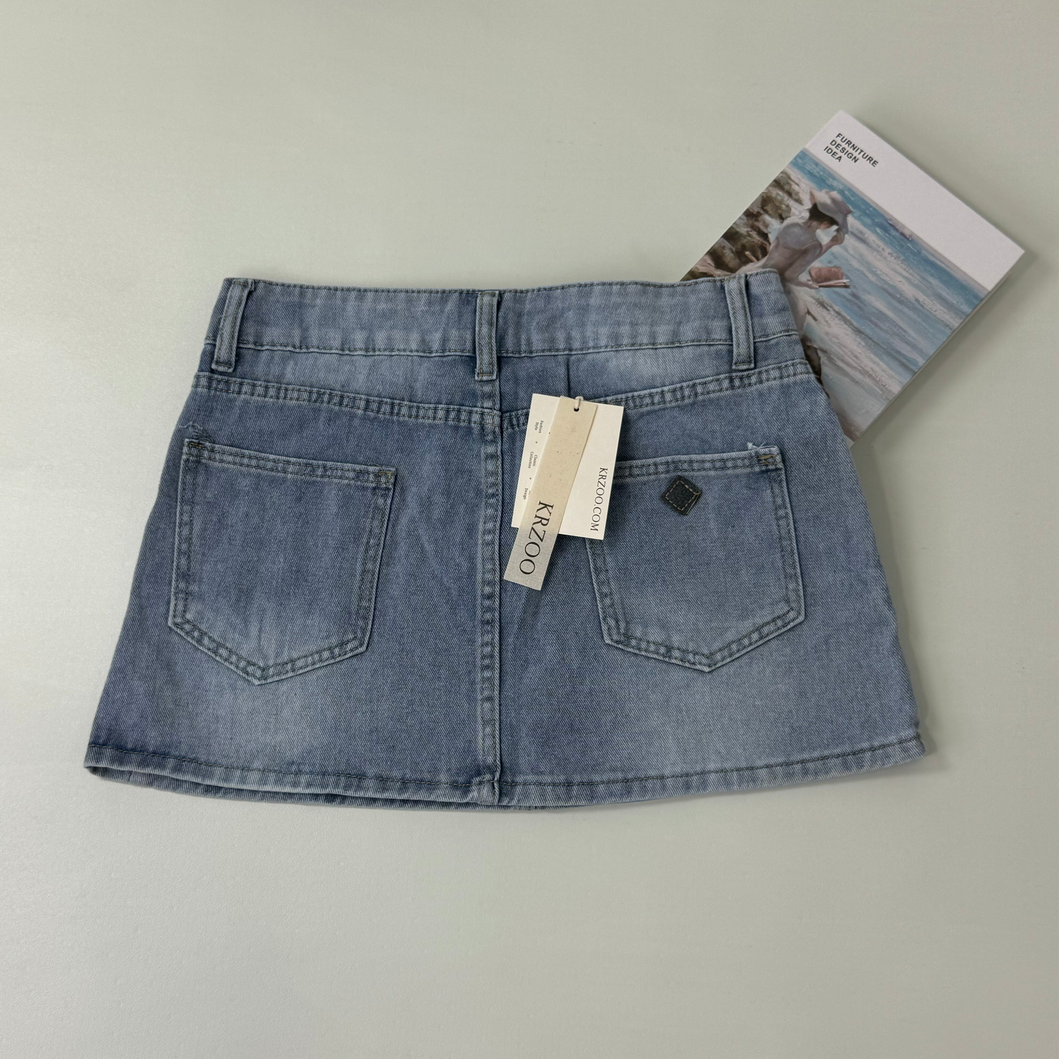 Double-button high-waisted slim-fit denim skirt
