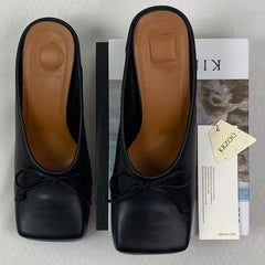 Round-head bow-fronted low-heeled shoes